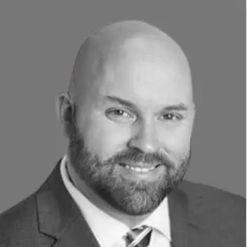 Black and white headshot of SSE's Chief Information Security Officer and Chief Technology Officer, Charlie Sciuto.