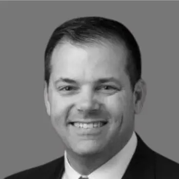 Black and white headshot of SSE's VP of Training and Government Service Programs and Human Resources, Jeff Uhde.